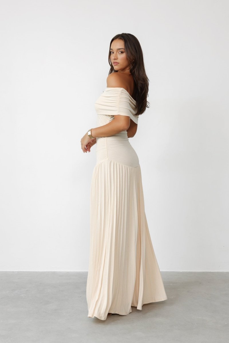 Aurora - Elegant Women's Wedding Guest Dress with Off-Shoulder Neckline and Pleated Maxi Skirt