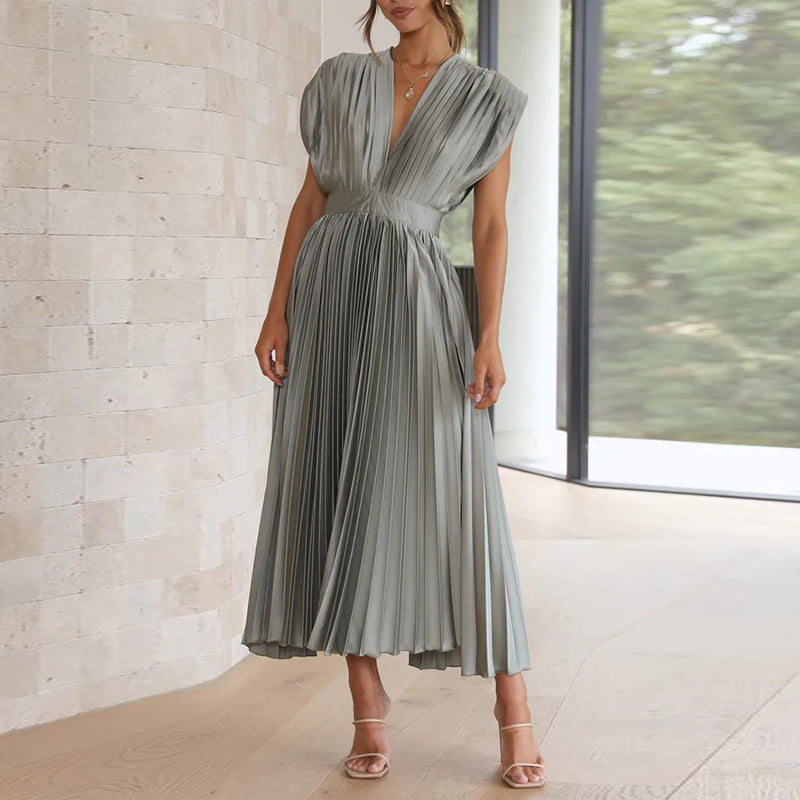 Grace - Flowy Women's Wedding Guest Dress with Deep V-Neck and Pleated Midi Skirt